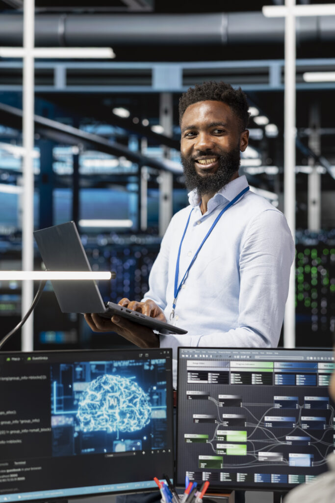 IT recruiting in Oklahoma professional working in a server room, representing technology staffing supported by local expertise.