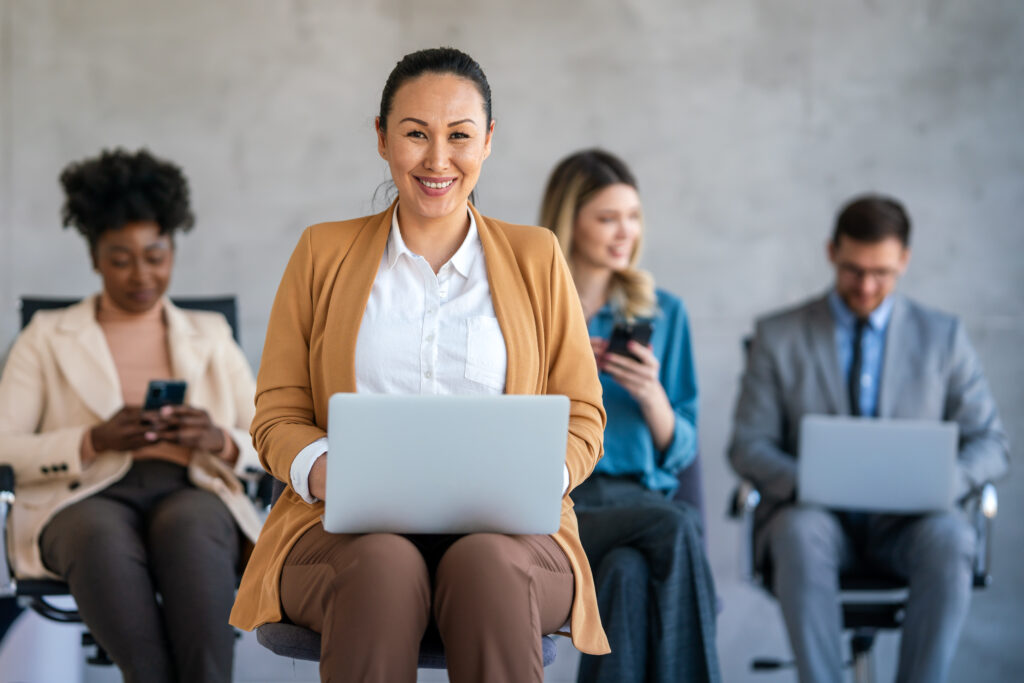 Job candidate preparing with her laptop as part of IT recruiting in Oklahoma, demonstrating technology staffing supported by local expertise.
