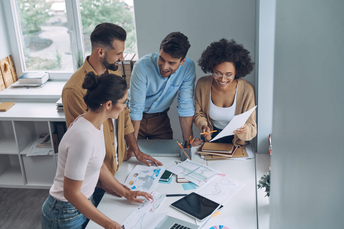 Team collaborating in an office at a local staffing agency.
