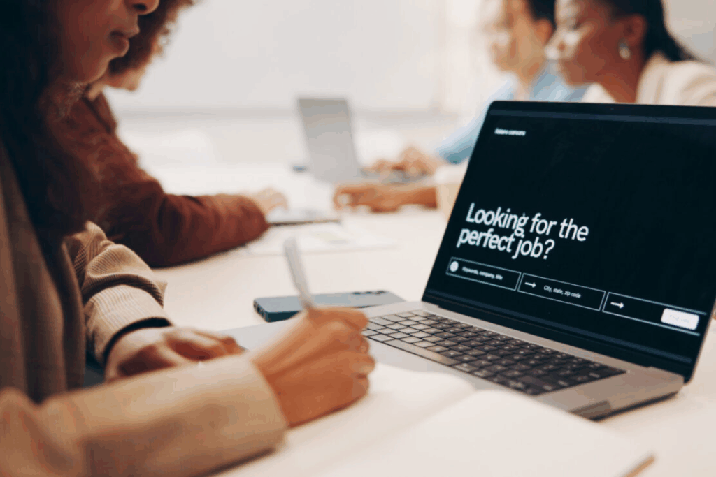 Laptop displaying a job search screen at a Tulsa recruiting firm, emphasizing local expertise and support for hiring success.