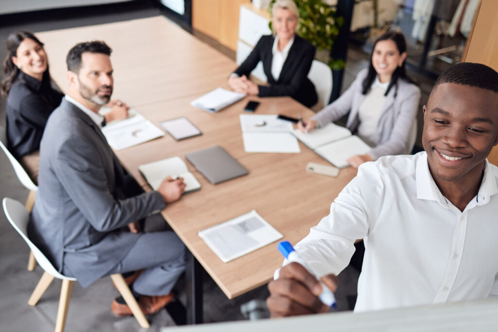 Team collaborating with staffing experts during a direct hire staffing meeting focused on permanent hire recruitment and long-term workforce growth