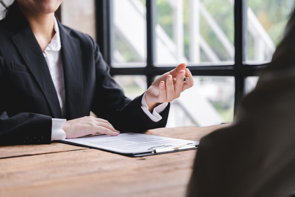 Recruiter conducting a professional interview while prepping for a job interview and providing job interview prep guidance to a candidate.